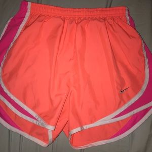 Coral Nike shorts